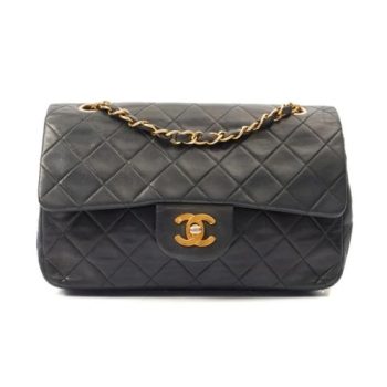 The Chanel Classic Small Flap Bag – timeless elegance in luxurious black caviar leather.