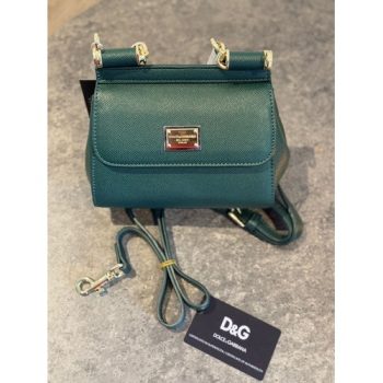 Dolce & Gabbana Small Sicily Elongated Bag in Dauphine leather with top handle and detachable strap.