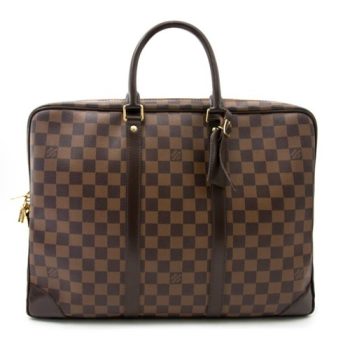 Louis Vuitton Porte-Documents Voyage in Damier Ebene canvas with gold-tone hardware, featuring a spacious interior, dual top handles, and a detachable shoulder strap.