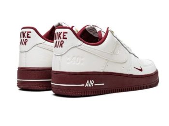 Nike Air Force 1 Low "40th Anniversary" Sneakers – men's white and burgundy leather shoes with gold details and ‘40’ motif.