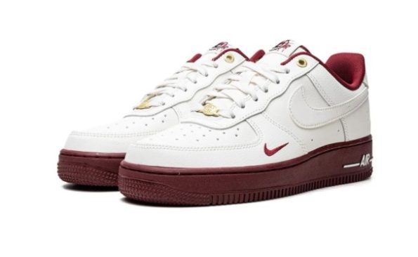 Nike Air Force 1 Low "40th Anniversary" Sneakers – men's white and burgundy leather shoes with gold details and ‘40’ motif.