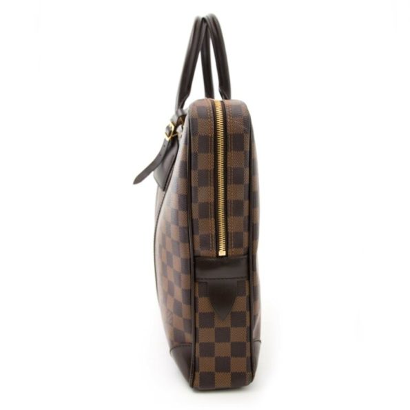 Louis Vuitton Porte-Documents Voyage in Damier Ebene canvas with gold-tone hardware, featuring a spacious interior, dual top handles, and a detachable shoulder strap.